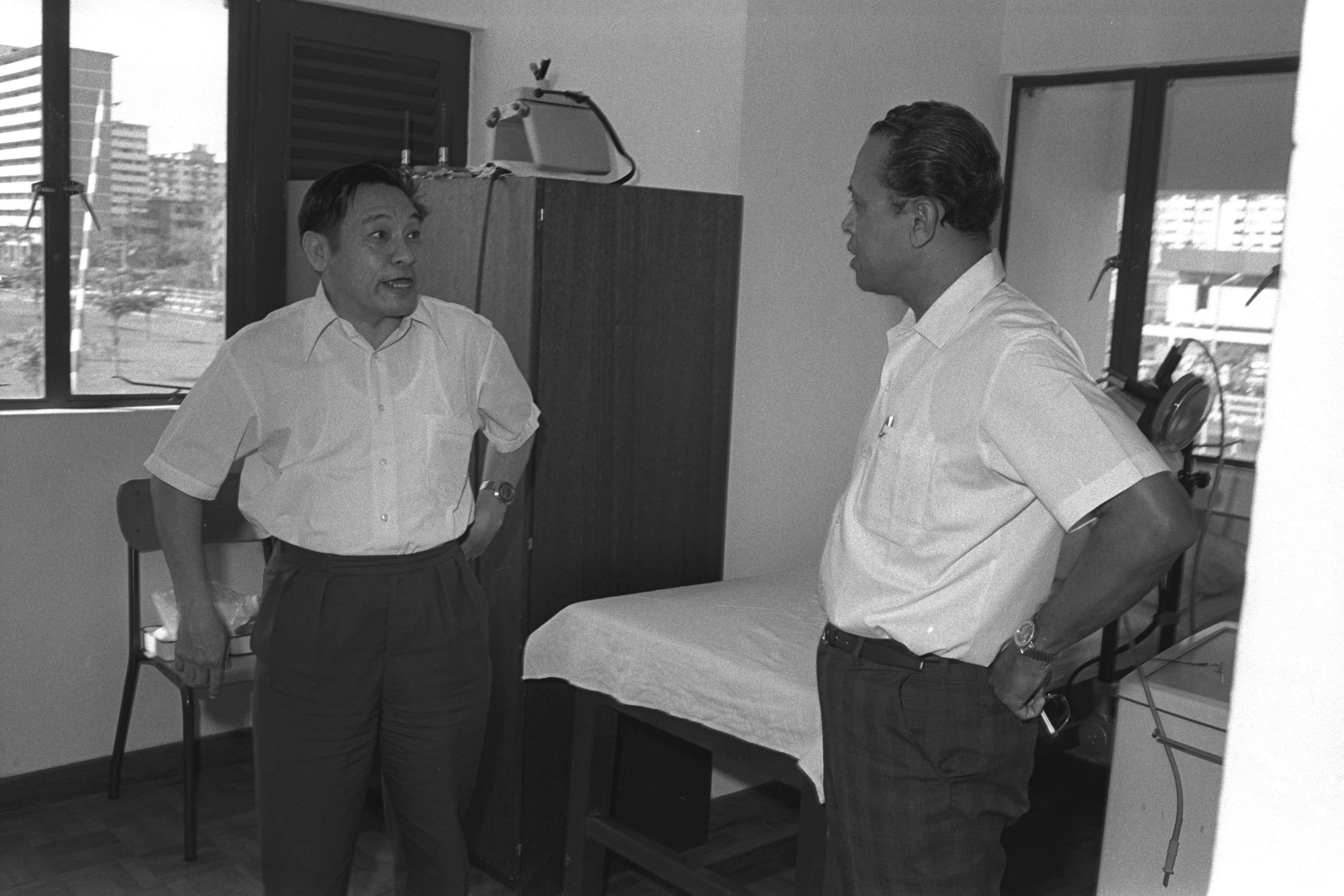 Minister for Social Affairs Othman Wok (right) viewing a flat for athletes at the SEAP Games Village in Toa Payoh, 1973. Ministry of Information and the Arts Collection, courtesy of National Archives of Singapore.